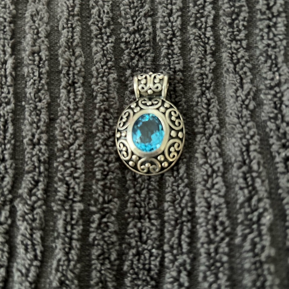 Artisan Sterling silver and Blue topaz pendant